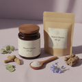 Shanti Churna herbal powder in dark glass jar with brahmi leaves and shankhpushpi flowers on soft lavender surface