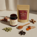 Rakta Shuddhi herbal powder in dark glass jar with manjistha root and triphala berries on cream linen surface
